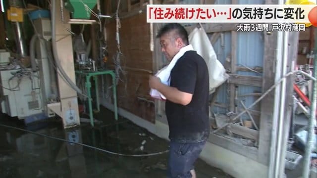 作業小屋の片付けに取りかかる中村さん