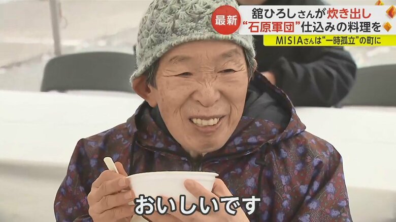 避難所前の行列に3時間並んだという女性