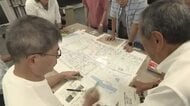自主防災組織の役割学ぶリーダー研修　災害時の危険個所を地図に書き込み現地の状況を確認