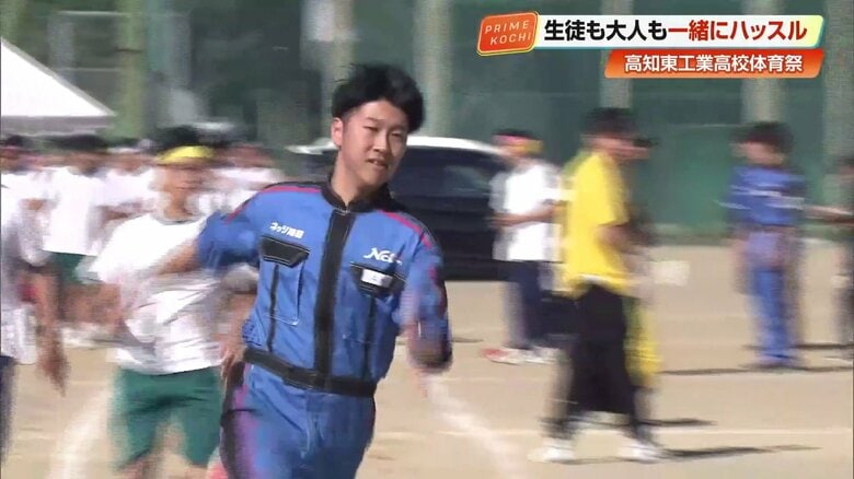 トラックを走る県内企業の社員