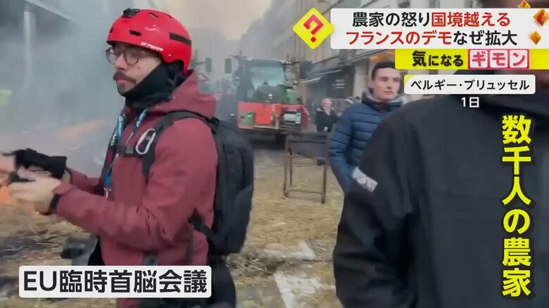 ブリュッセルのEU臨時首脳会議会場近くに集まった農家の人々