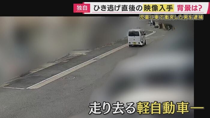 走り去る車