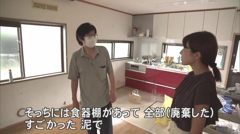 浸水被害を受けた男性