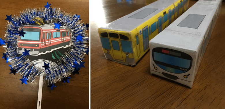 (左)テレビに向かって振れる“電車推し”うちわ (右)ラップの空き箱で作った電車