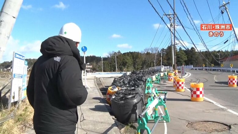 電線が垂れ下がり通行止めになった道