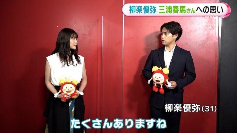 めざましくん人形を手にインタビュー