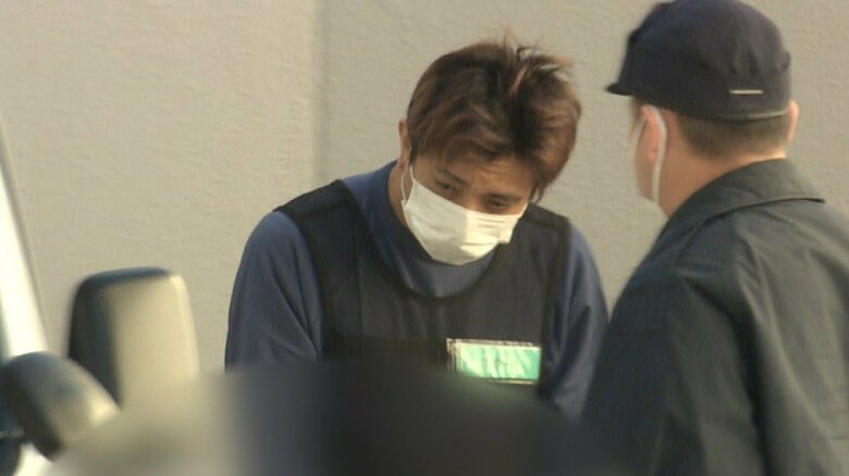 「名古屋事件」で送検される田中被告(今年2月 愛知県警中署)
