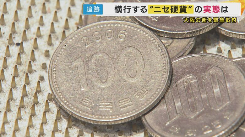 「100ウォン」硬貨と100円玉