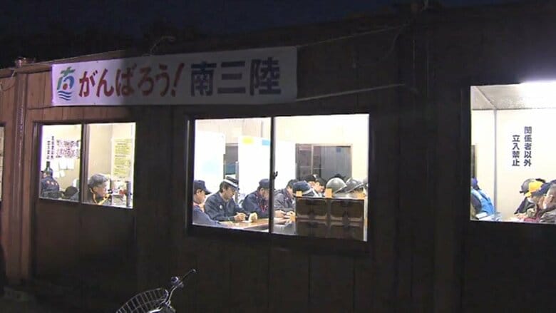 捜索状況を共有する警察や消防、自衛隊