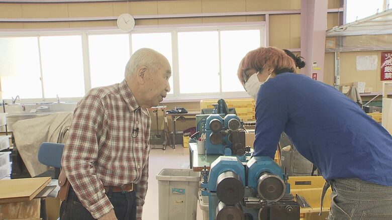 佐渡恭明会長とスタッフ