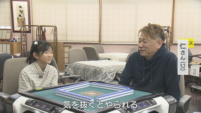 娘にエールを送る父