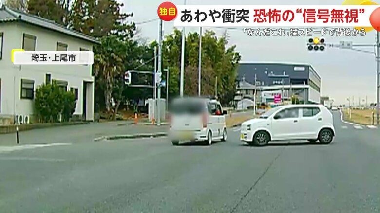 反対車線の車と衝突しかけていた白い車（視聴者撮影）