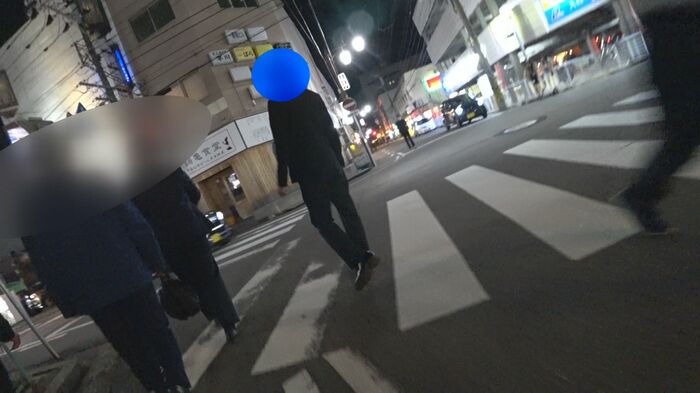 客引き行為をする男