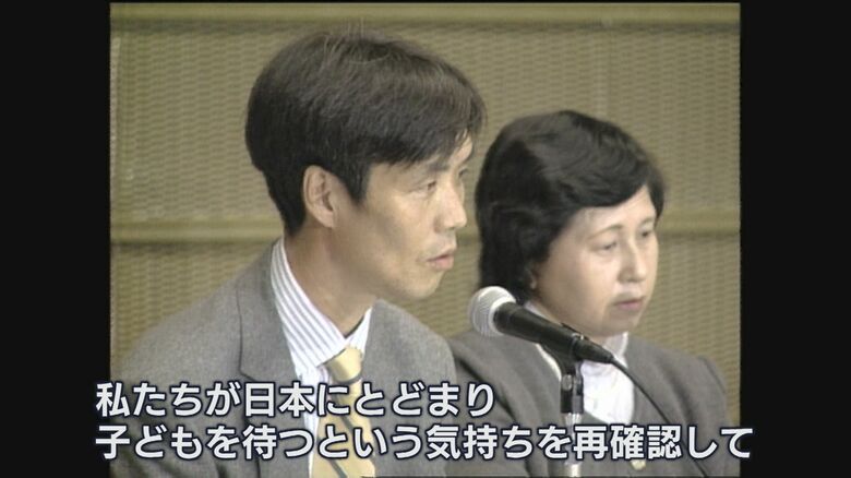 日本に残ることを決め、北朝鮮のバッジを外す