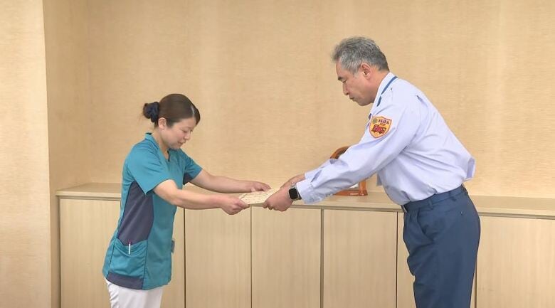 感謝状を贈られる木下さん