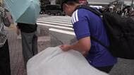 “森保ジャパン”決勝トーナメント進出にお祭り騒ぎの渋谷でも“ポイ捨て”は減少　ごみ拾いするサポーターの姿も
