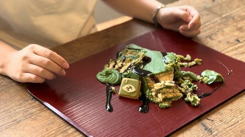 熱波や豪雨など異常気象、山火事が多発する様子を表現したケーキ（SDGsジャパンより提供）