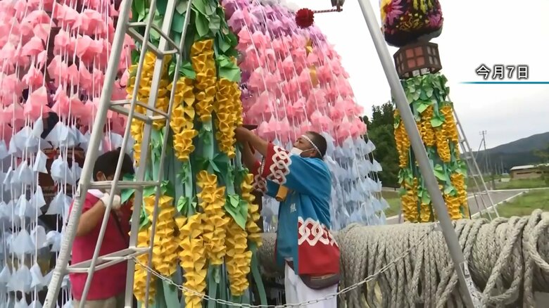 入念に山車の準備をする斉藤さん