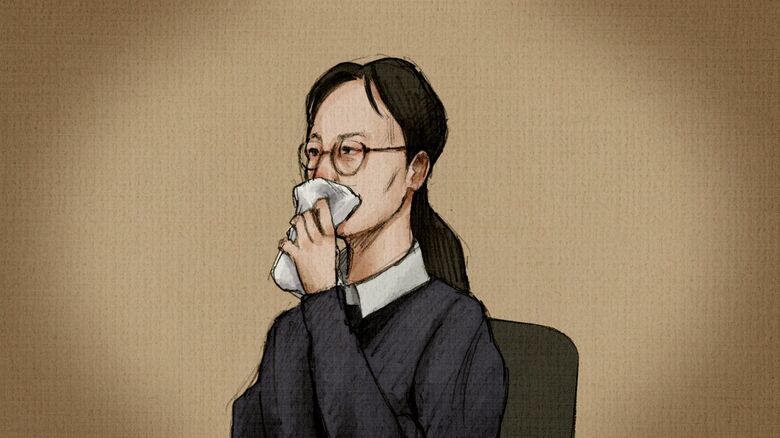 涙を浮かべる田村浩子被告