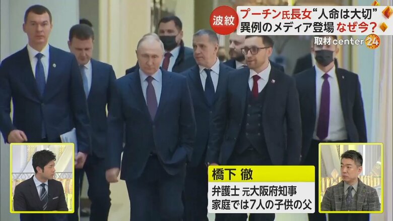 スーツ姿で歩くプーチン大統領
