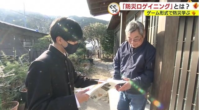 手作りチラシを配り住民に告知