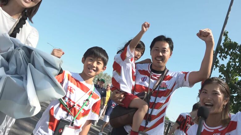 日本のサポーターと「頑張れニッポン！」