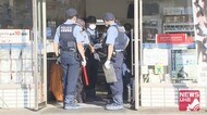 駆け付けた警察官に
