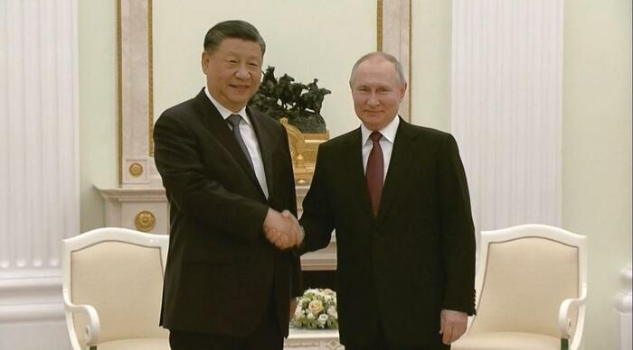 非公式会談での習主席・プーチン大統領
