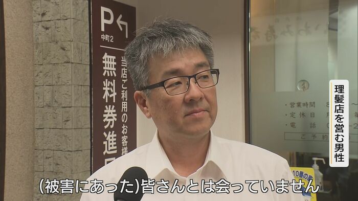 商店街内の理髪店を営む男性「言葉が見つからない」