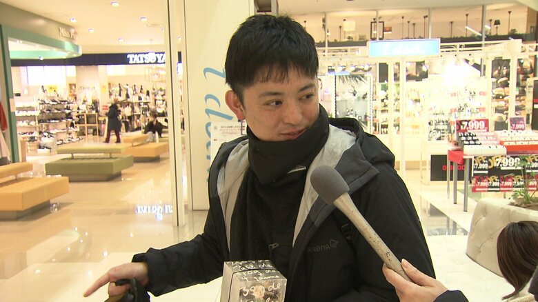 妻の出産祝いにクッキーを買いに来た男性