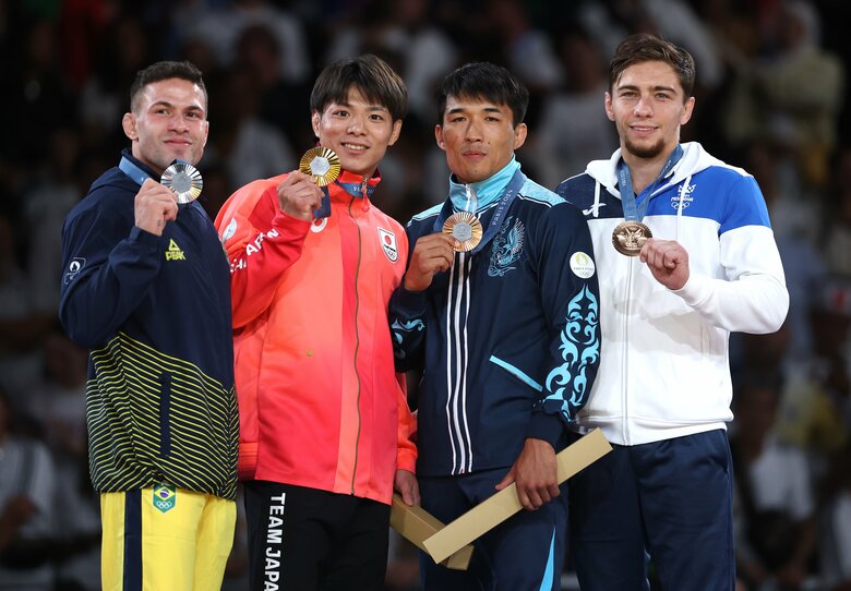 五輪連覇を果たした表彰台（写真・ゲッティ）