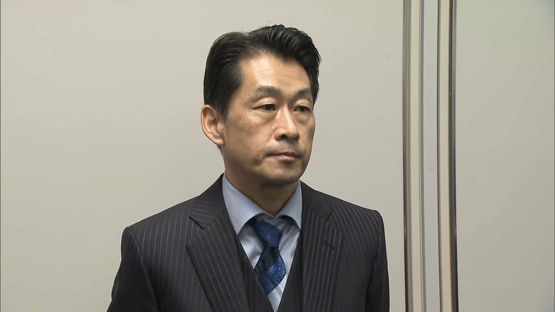 取材に応じる司法教育支援協会･熊田彰英弁護士