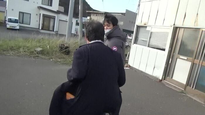 記者の質問にはほぼ応じなかった桂田社長