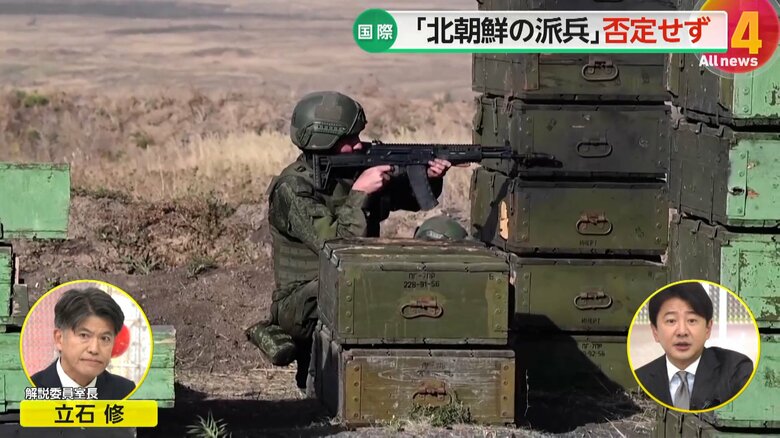 物陰に隠れ、銃を構える兵士とみられる人物