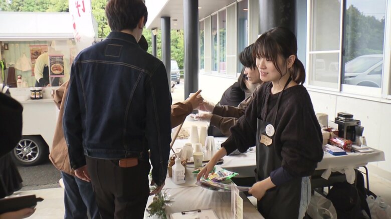 客に声をかける竹田さん