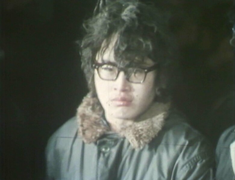 逮捕され連行される当時の加藤氏
