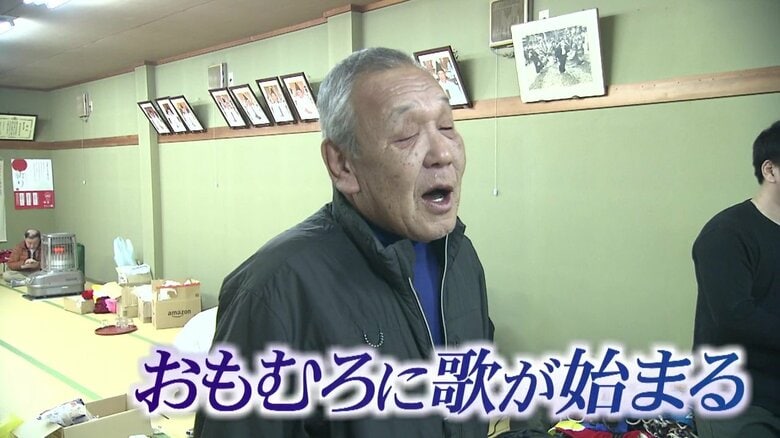 指名された区長が歌い始める