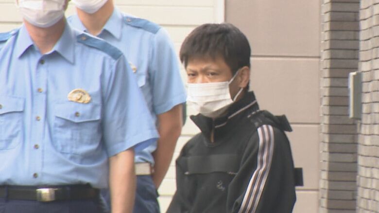 送検される中村被告