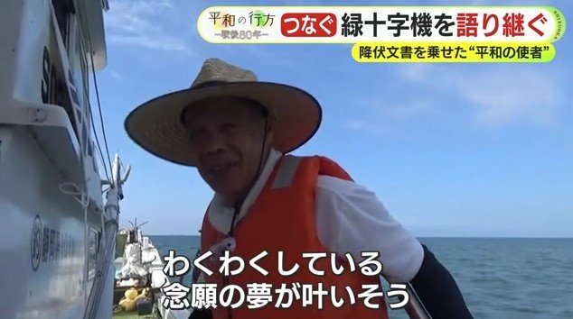 水中探索に同行する中田さん