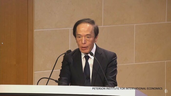 19日、ワシントンのピーターソン国際研究所で講演した植田総裁