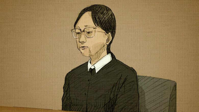 静かに判決を聞く田村浩子被告