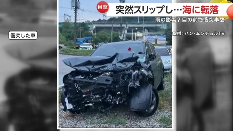 トラックと衝突した車