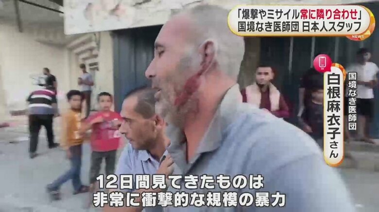 顔に血のついた男性