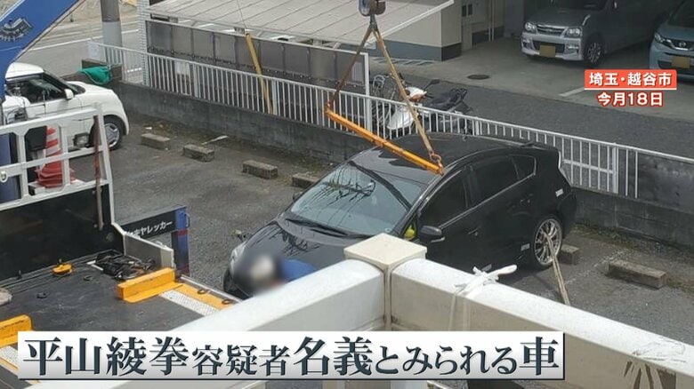 レッカーされる車