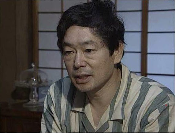 インタビューに答える河野義行さん