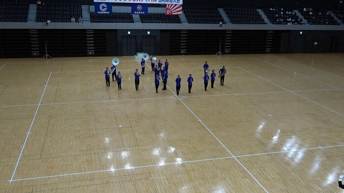 秋田県大会で演技を披露する部員たち（提供：大館国際情報学院吹奏楽部）