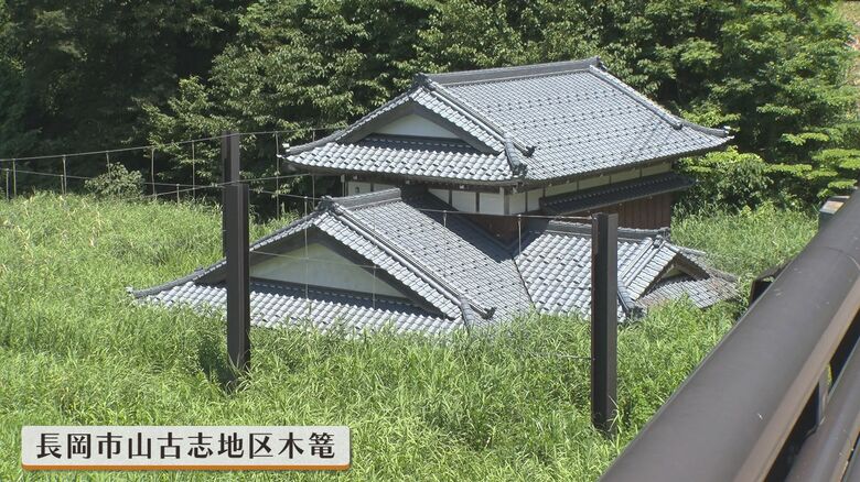 中越地震で水没した家屋