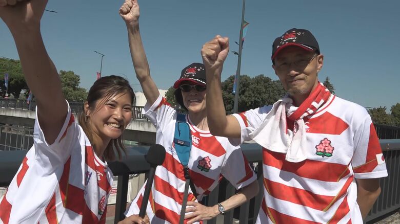 日本のサポーターと「頑張れニッポン！」
