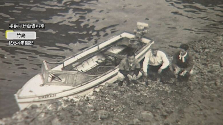 竹島へ上陸したときの写真（左端が野津さん）