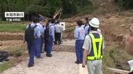 金子国交大臣が大雨で被災の氷見を視察　地区では土砂の流入で川がせき止められる